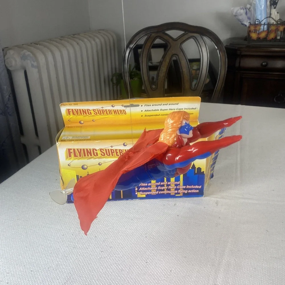 Flying Super Hero Action Figure Toy Battery Operated Cape Included Spins In Air